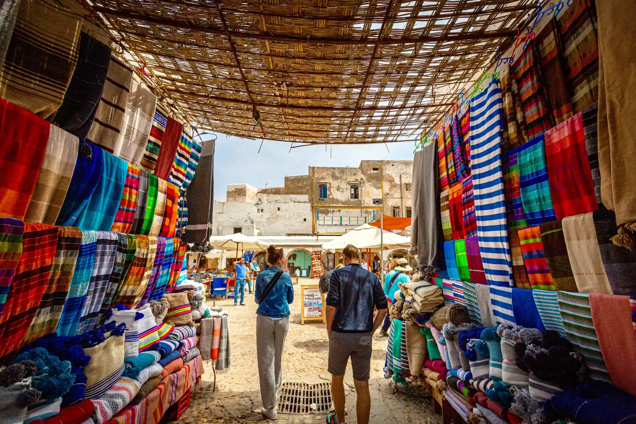 Artisan crafting leather goods in the Fes tanneries, Morocco