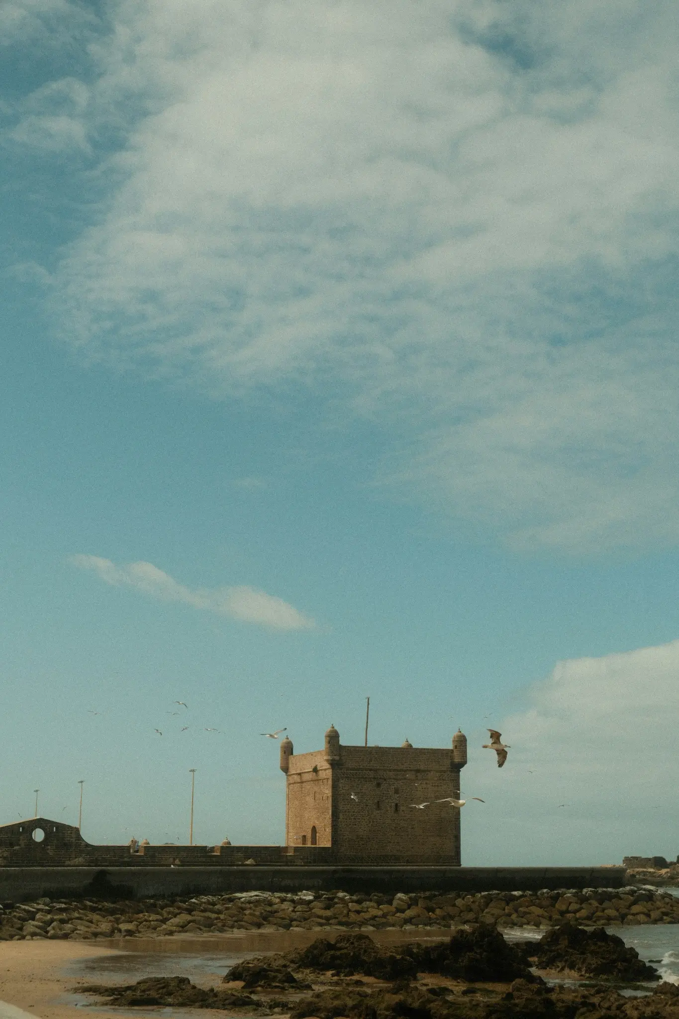 Kitesurfers and windsurfers on the bay at Essaouira