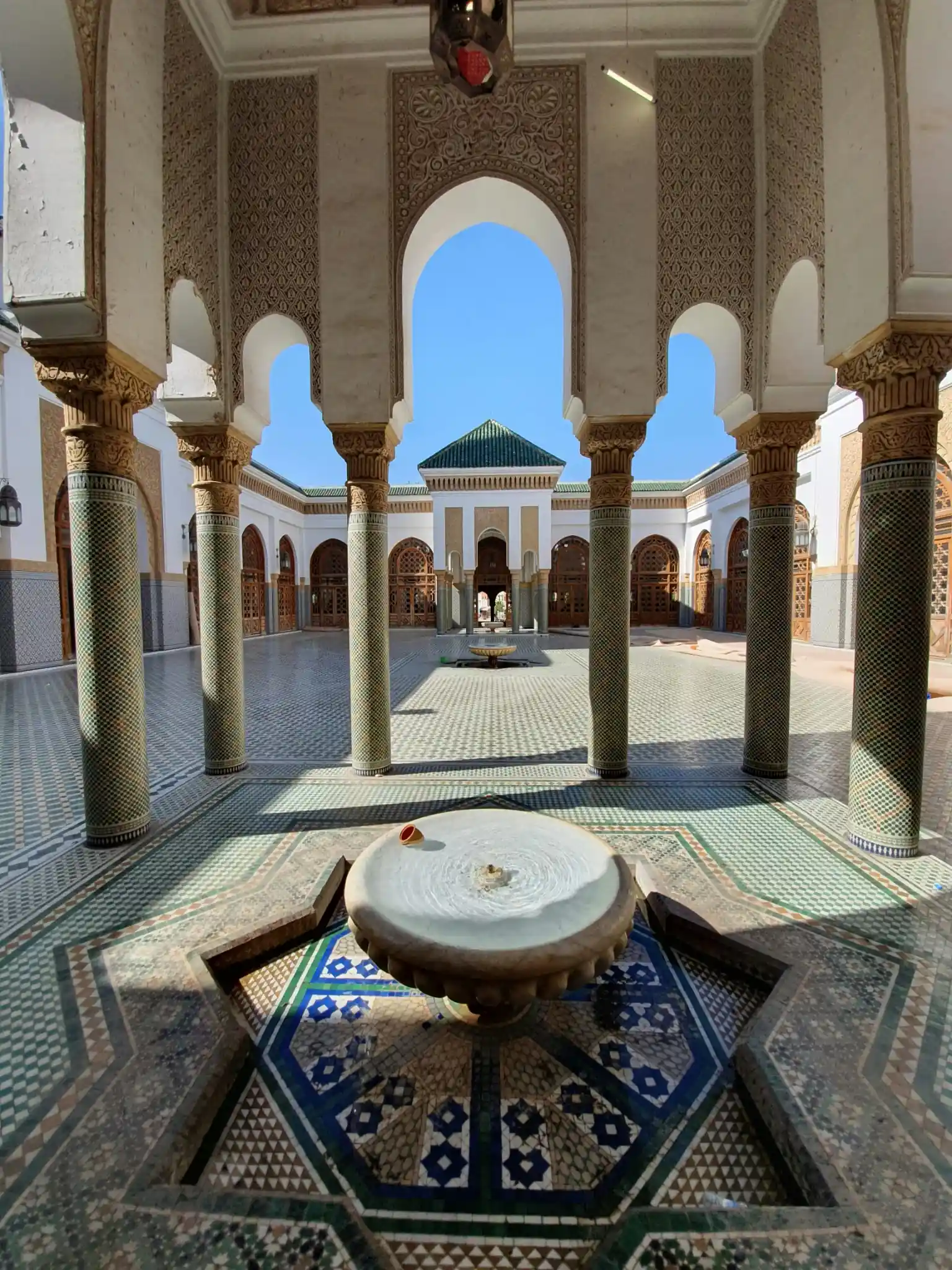 Authentic Moroccan pastilla dusted with sugar and cinnamon served during culinary Fez tours.