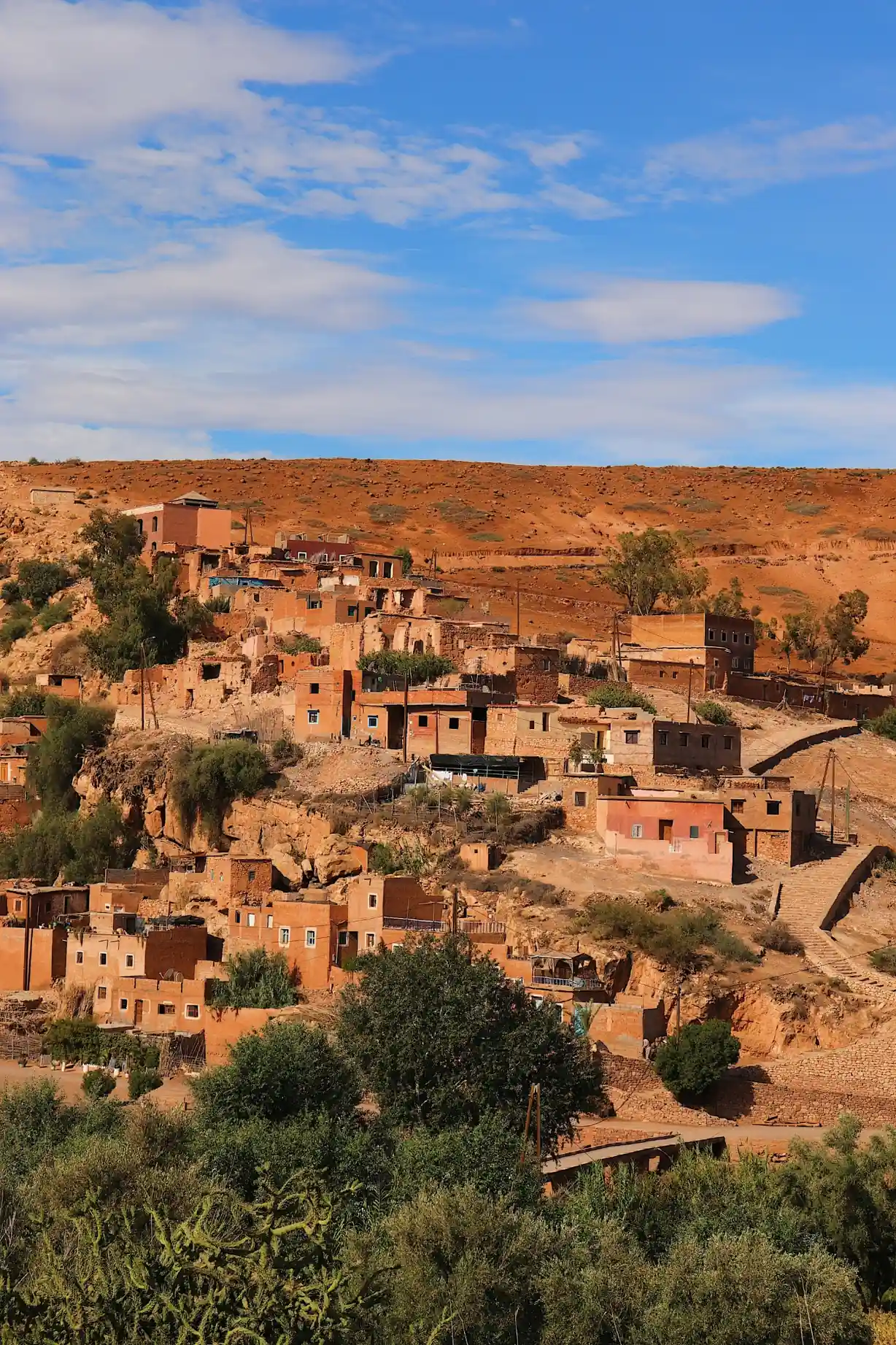 Clouds rolling over high-altitude mountain passes in the dramatic landscape of Imlil Atlas Mountains.