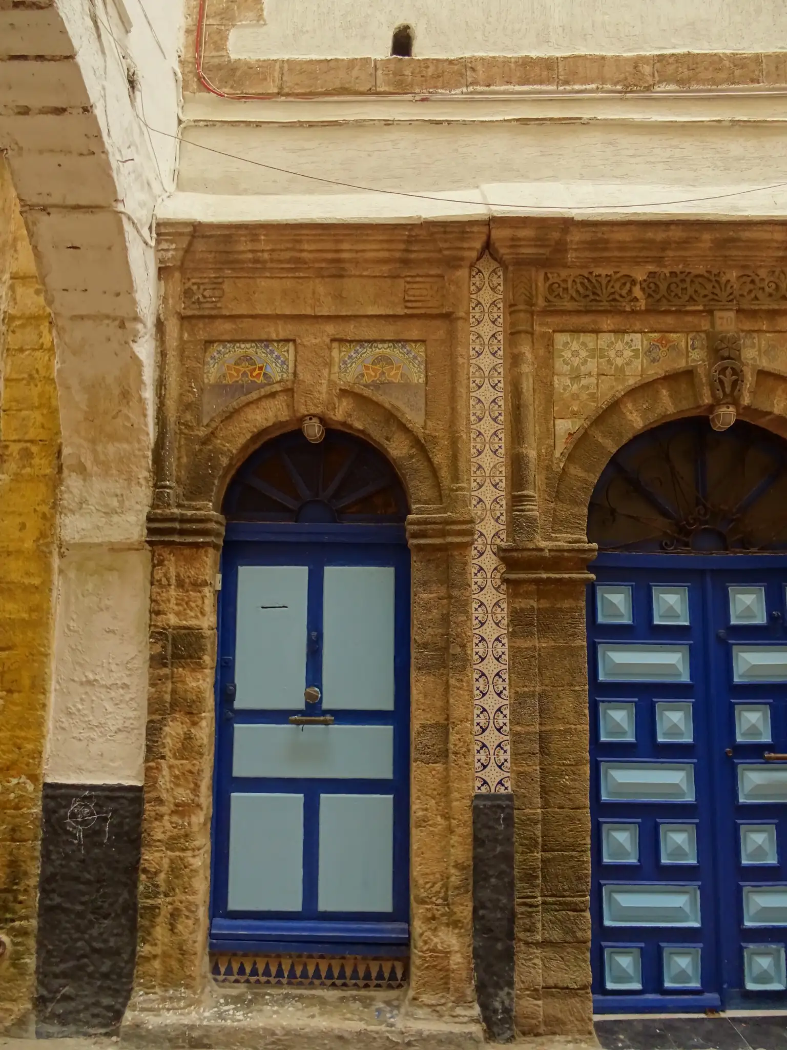 Local artisans selling handmade crafts in Essaouira