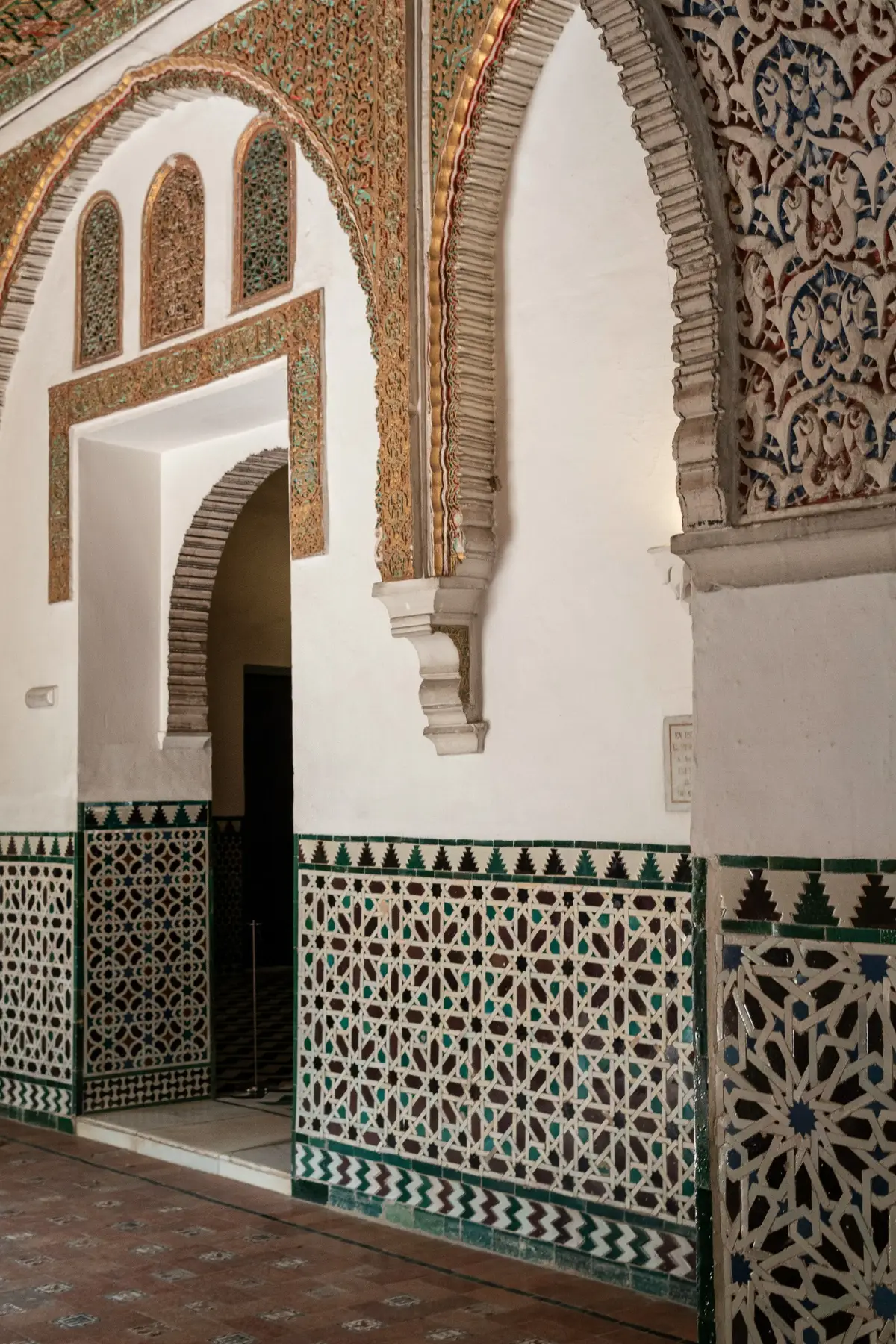 All inclusive Morocco vacation —Riad courtyard with breakfast table set by the fountain, Marrakech