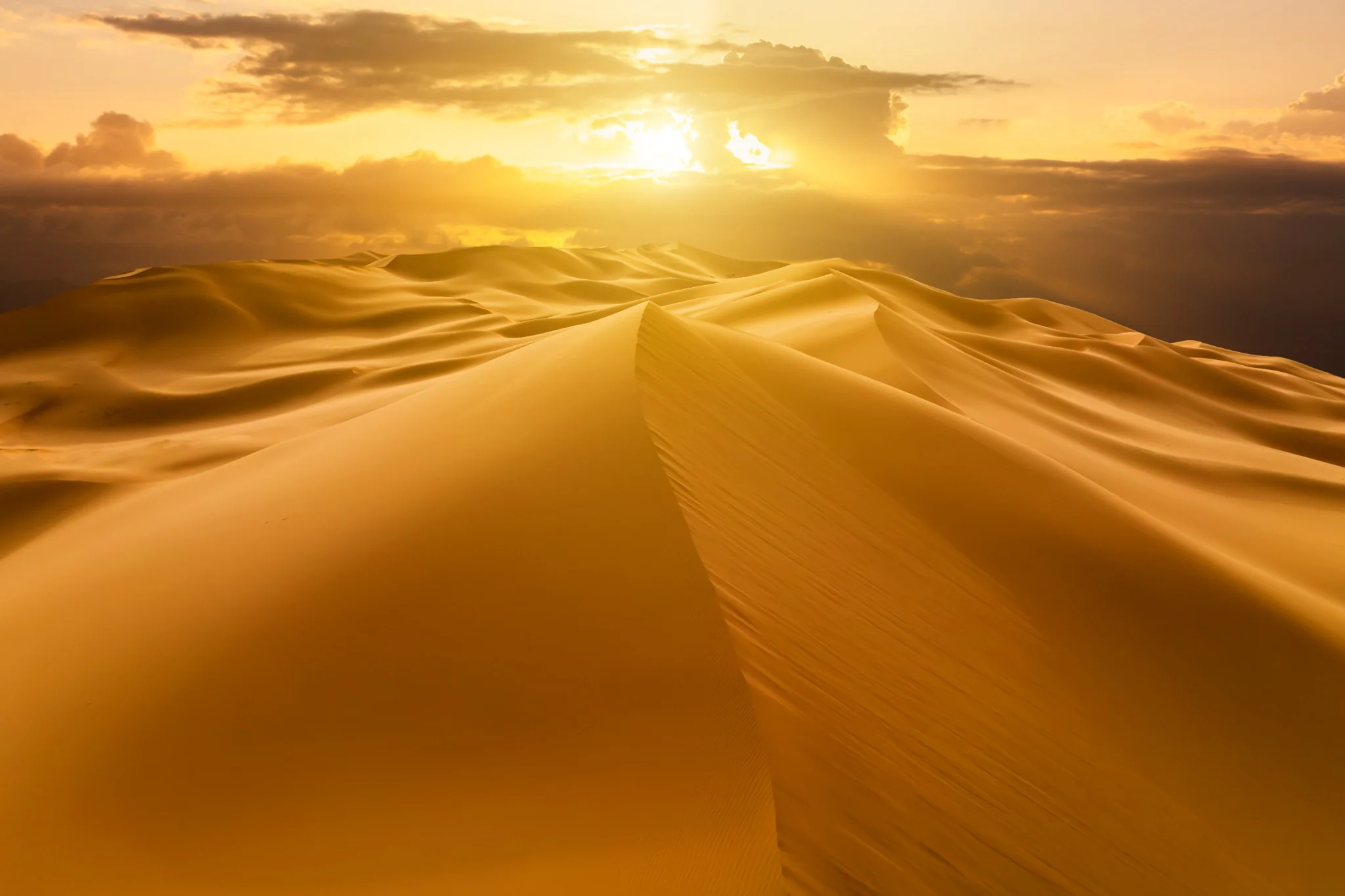 all Morocco tours- Sunrise over the golden Erg Chebbi dunes near Merzouga, Sahara